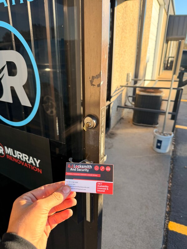 Commercial door lock serviced by A-I Locksmith And Security technician, installing or rekeying a business storefront lock
